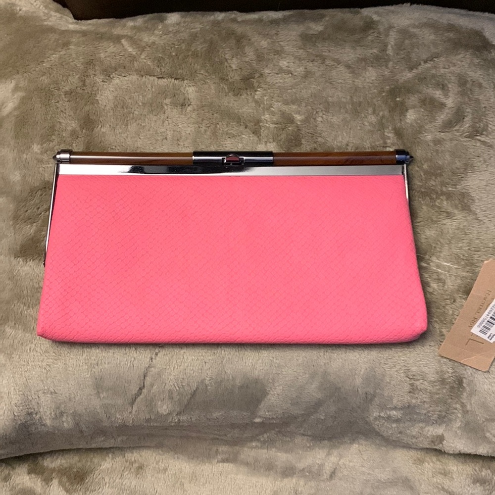 New Rachel Roy pink clutch with gun metal hardware.